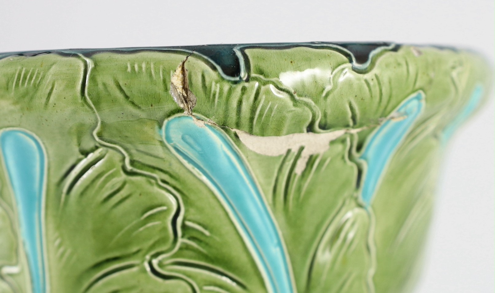 A pair of Burmantofts Art Nouveau faience jardinieres on matching pedestals, c.1900, total height 69cm, diameter 32cm, minor faults
